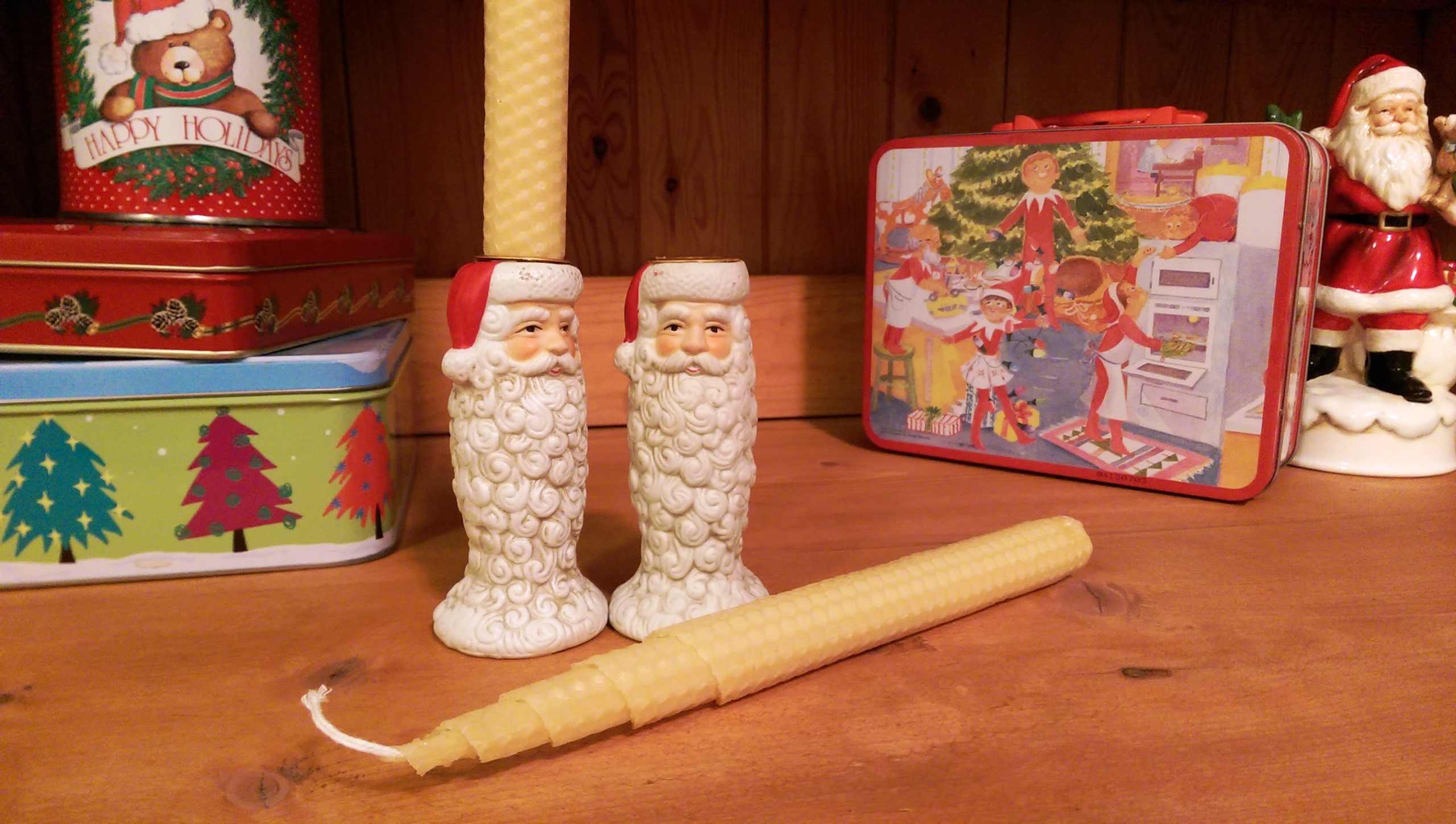 My thrift store gift finds: tins ready to be filled with homemade cookies, and a great set of candlesticks paired with my homemade beeswax candles.